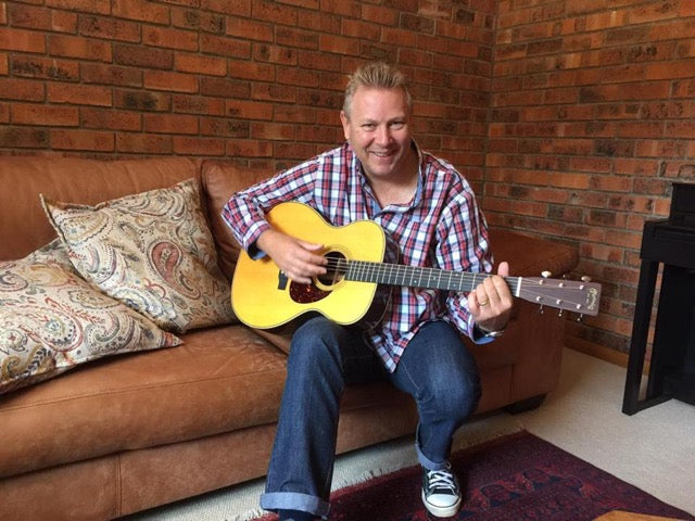 Reinhard purchased a Martin OM–28 from Guitar Gallery. 