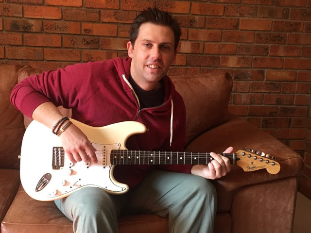 Gert with the Fender Stratocaster he bought from Guitar Gallery